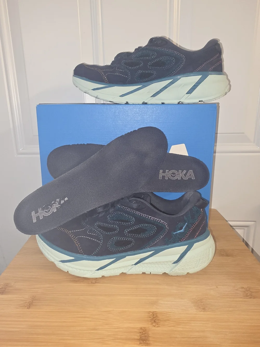 HOKA U Clifton L in a Suede Navy Leather and Mint Lightweight Running Shoes